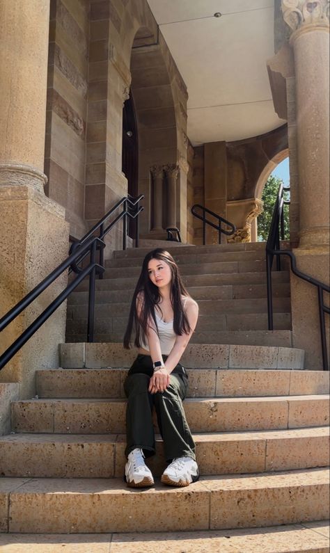 posing on stairs, stairs pose, downtown girl outfit, historical stairs, europe stairs, europe pose inspo, sitting down pose, converse xc motion, green cargo pants, cargo pants outfit, cargo fit Poses For Pictures Instagram Sitting, Pictures On Stairs, Sitting Down Pose, Pose Poto, Ideas Selfies, Cargo Fit, Studio Photography Poses, Bff Photoshoot Poses, Cargo Pants Outfit