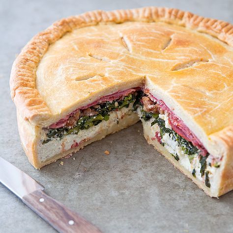 Made to feed a crowd, torta rustica, or Italian Easter pie, is a hefty construction of meats and cheeses wrapped in a pastry crust. Italian Easter Pie, Easter Pie, Hot Cross Bun, Italian Easter, Easter Dinner Recipes, Savory Pie, Americas Test Kitchen, Easter Dinner, Feeding A Crowd