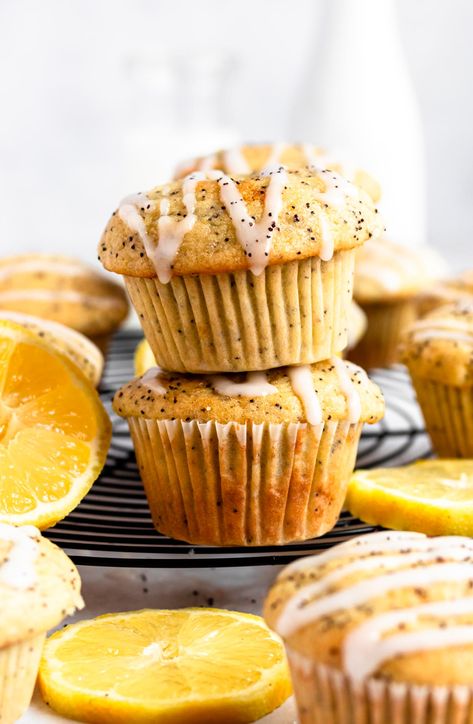 Stack of two lemon poppyseed muffins on a cooling rack. Small Chocolate Cake, Lemon Muffin Recipes, Triple Chocolate Muffins, Poppyseed Muffins, Lemon Poppy Seed Muffins, Dairy Free Brownies, Lemon Ricotta Pancakes, Seed Muffins, Moist Muffins