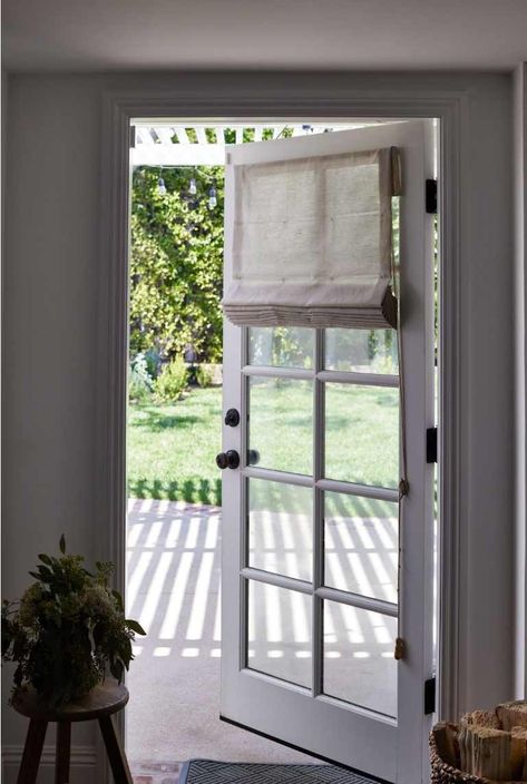 Elevate Your French Doors with Outside Mount Window Treatments | Everhem French Doors With Shades, Roman Shade On Door, Back Patio Door Curtains, Bedroom With Garden View French Doors, French Doors Privacy Ideas, Door Treatments Interior, Roman Shades On French Doors, French Door Window Treatments Ideas, Privacy Film For Doors