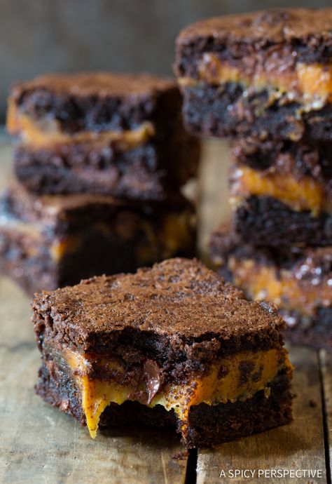 Dazzling Gooey Caramel Stuffed Brownies (for Halloween!) | ASpicyPerspective.com Caramel Brownies From Scratch, Easy Caramel Brownies, Brownies For Halloween, Killer Brownies, Brownies Caramel, Stuffed Brownies, Caramel Brownies Recipe, Brownie Pudding, Brownie Bars