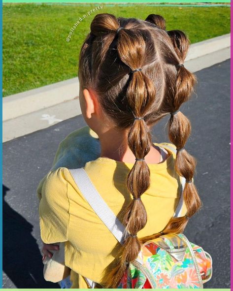 This playful style features two bubble ponytails, making it a standout choice among school hairstyles for kids 2024. The bubbles add volume and a fun texture, perfect for school or playtime.

Photo credit by: polished.n.pretty School Picture Day Hairstyles For Kids, Toddler Curly Hairstyles, Simple Back To School Hairstyles, New Braid Hairstyles, Bubble Ponytail Hairstyles, School Hairstyles Ideas, School Hairstyles For Kids, Braid Hairstyles For Kids, Futuristic Hair