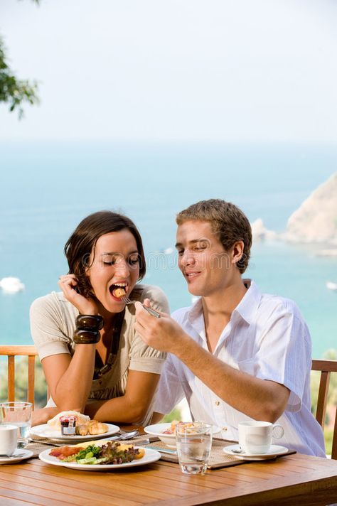 Couple Eating Breakfast. A young couple enjoying breakfast outside with an ocean #Sponsored , #ad, #Sponsored, #Eating, #young, #breakfast, #Breakfast Couple Eating Breakfast, Breakfast Outside, Couple Eating, Couple Vacation, Ocean Backdrop, Eating Breakfast, Old Couples, Couples Images, Young Couple