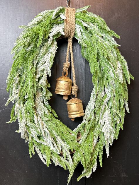 Winter greenery wreath, Norfolk pine wreath, Christmas flocked greenery wreath, snowy Christmas wreath, oval farmhouse Christmas wreath by WreathsByNadia on Etsy Oval Christmas Wreath, Outdoor Holiday Planters, Holiday Planters, Oval Wreath, Diy For Christmas, Farmhouse Christmas Wreath, Winter Planters, Winter Farmhouse, Norfolk Pine