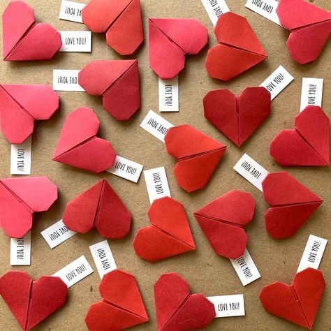 "Set of 16 Origami Hearts with custom fortunes! Last minute order? Send me a DM for express details! There are so many uses for these hearts that it's hard to list. Use them as a romantic trail for your loved one, as a store window décor, customer's add-on gift, as surprise love notes spread around the house... and popular wedding party favors!  These are Eco friendly, made from premium paper with high recycled content, besides being recyclable, though I recommend saving them as book-page markers!  Our Handmade paper hearts will come with your custom words or messages, inspired by cookie fortunes!  By the way, they also make a cute wallet keepsake!  INCLUDES 💗Origami paper hearts in the color of your choice. (Last photo shows color samples) 💗Each heart comes with a paper strip with your Heart Structure, Origami Hearts, Wedding Name Tags, Origami Heart, Store Window, Wedding Name, Client Gifts, Paper Hearts, Wedding Party Favors