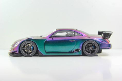 A very cool @k.customs.diecast 😍😍😍 Here's your once in a lifetime chance to own a Chameleon Lexus SC430!🤘🏼 . . 🎨 custompaintsinc Chromacoat Green . . #Lexus #LexusSC430 #SC430 #SuperGT #JGTC #kcustomsdiecast #diecast #scale_1_18 #scale118 #RaceCar #TrackCar #Euro #JDM #import #stance #driftcar #scale_models #LiveAndLetDiecast #ModelCar #Lowered #Modified ( #📷 @k.customs.diecast ) Lexus Sc 430, Lexus Sc430, Chameleon Color, Track Car, Diy Car, Drift Cars, Once In A Lifetime, Japanese Cars, Car Wrap