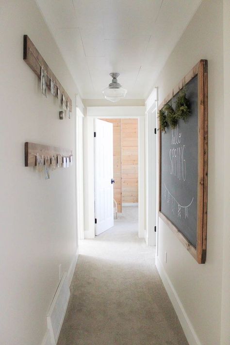 A Farmhouse Style Hallway Makeover - making it in the mountains    #minimalhallwaydesign  #minimalhallwaydecor #modernhallwayideas #westholmeinteriors #homeaccessories  #simonsayshome #stylishhomedecor #simplestylinghome #easyinteriortips Hallway Paint Colors, Farmhouse Hallway, Hallway Paint, Hallway Makeover, Hallway Colours, Dark Hallway, Narrow Hallway Decorating, Upstairs Hallway, Hallway Wall Decor