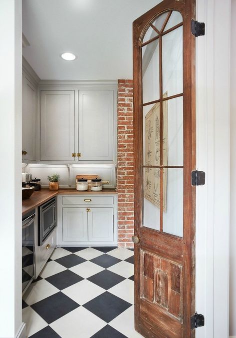 Charming butler pantry! This tranquil Tudor cottage was renovated on HGTV's Fixer Upper by Chip and Joanna and is known as the Scrivano House. Checkered Floor, Magnolia Market, Classic Kitchen, Antique Doors, Butler's Pantry, Grey Cabinets, Trendy Kitchen, Style At Home, Fixer Upper