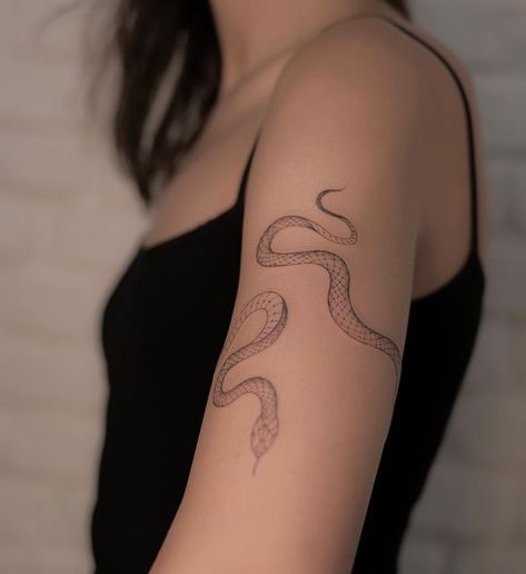 Ball Python Wrapped Around Arm Tattoo, Witch Snake Tattoo, Upper Arm Snake Tattoos For Women, Snake Arm Cuff Tattoo, Snake Line Art Tattoo, Snake Bicep Tattoo Women, Rattlesnake Tattoo Feminine, Snake Arm Band Tattoo, Wrap Snake Tattoo