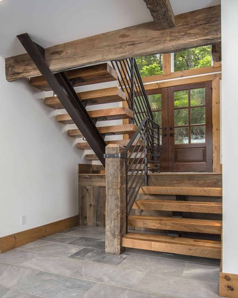 At the main entryway of this mountain home is custom floating staircase. Mountains In North Carolina, Cabin Stairs, Rustic Staircase, Rustic Stairs, Blowing Rock Nc, Wood Staircase, Floating Stairs, Modern Mountain Home, Diy Furniture For Small Spaces