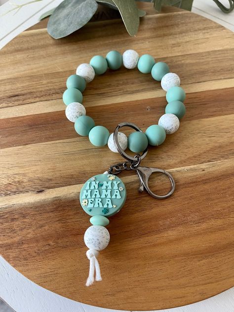 Blue In my mama era keychain wristlet, Mama Era Keychain, Mama Keychain, Gifts For Moms, Silicone Keychains, Keychain Wristlet Combo, by MadebyTnK on Etsy Silicone Keychains, Mama Keychain, Wristlet Keychains, Beaded Wristlet, Keychain Gifts, Gifts For Moms, Keychain Wristlet, Beaded Lanyards, Tassel Keychain