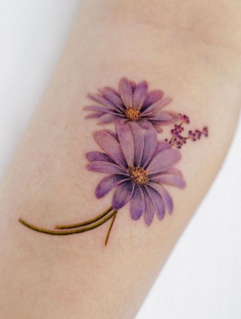 50+ Stunning Flower Tattoos - TheTatt Irish Flower Tattoo, Best Feminine Tattoos, Purple Flower Tattoos, Daisy Flower Tattoos, Pretty Flower Tattoos, Purple Tattoos, Irish Tattoos, Watercolor Tattoo Flower, Wildflower Tattoo