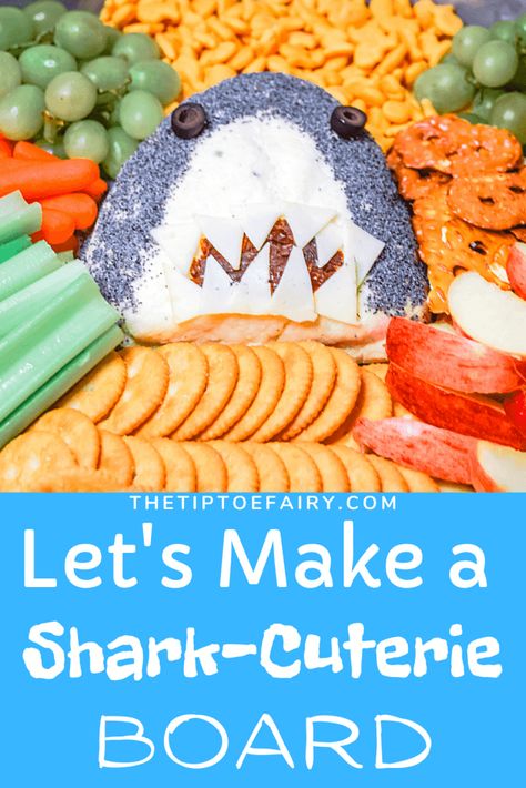 It's Shark Week! Make this adorably easy Shark-Cuterie Cheese Ball for a delicious Charcuterie Snack Board while you watch! #cheeseball #easyrecipes #appetizers #charcuterie #charcuterieboard Ocean Cheese Board, Shark Cheese Board, Shark Cheese Ball, Shark Charcuterie Board Ideas, Shark Week Meal Ideas, Shark Week Snacks For Adults, Shark Snacks For Birthday, Shark Veggie Tray, Jaws Movie Night Food