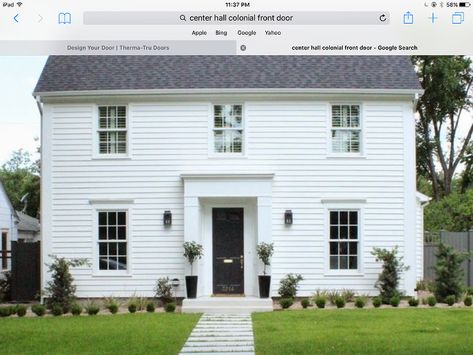 Presenting this stunning 2 story Colonial style house with white siding, and a modern white molding surrounding the black entry door at its finest appeal. White Siding Colonial House, House With White Siding, White Brick Colonial House, Colonial House Exterior Design, Exterior Colonial House, House Exterior Colonial, Modern Colonial House Exterior, 2 Story Colonial, Brick Colonial House