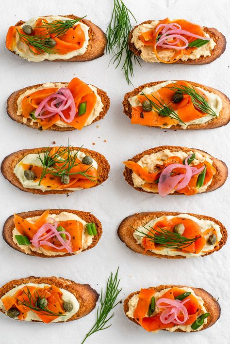 I ❤️ appetizers that can be served chilled! This features our smoky carrot lox 🥕 on a crunchy crostini with our hummus or dill spread as a creamy base. Full of flavour, perfect for summer ☀️, and almost too pretty to eat! Full recipe at ⤵️ https://tastythriftytimely.com/smoky-lox-crostini-your-guests-will-love/ #tastythriftytimely #veganrecipes #plantbasedrecipes #carrotlox #vegancreamcheese #veganappetizer #hummus Lox Crostini, Carrot Lox, Crostini Appetizer, Carrot Hummus, Carrots And Celery, Quick Pickled Red Onions, Lox And Bagels, Crostini Appetizers, New Year's Eve Appetizers