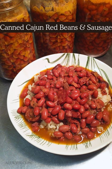 Looking for a meal prep canning recipe that is anything but bland? Try pressure #canning Cajun red beans and sausage for a ready-to-eat pantry meal with a kick!   It’s based on a tested Ball canning recipe, but we’ve kicked the flavor up a notch (or eleven), and improved the preparation instructions.   Heat up a jar of these meaty canned Louisiana-style red beans with smoky pork & andouille sausage and you’ll have a hearty, warming homemade dinner in almost no time at all. #mealprep #cajun Canning Red Beans And Sausage, Canned Red Beans Recipe, Red Beans And Sausage, Cajun Red Beans, Meal In A Jar, Andouille Sausage Recipes, Bean And Sausage Soup, Red Beans Recipe, Ball Canning