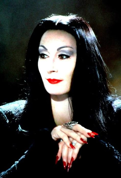 25 Most Iconic Red Lips in Film                                                                                                                                                                                 More Addams Familie, Toni Stark, Gomez And Morticia, Best Red Lipstick, Elvira Mistress Of The Dark, Anjelica Huston, Morticia Addams, Adams Family, The Boogeyman