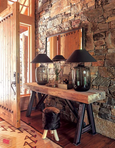 A 1990s Home Gets a Contemporary Refresh Mountain Home Mudroom, Mountain Aesthetic Home Decor, Rustic Modern Entryway, Mountain Home Entryway, Mountain Lodge Living Room, Modern Lodge Decor, Mountain Homes Interiors, Cabin Entryway, Log Cabin Lighting