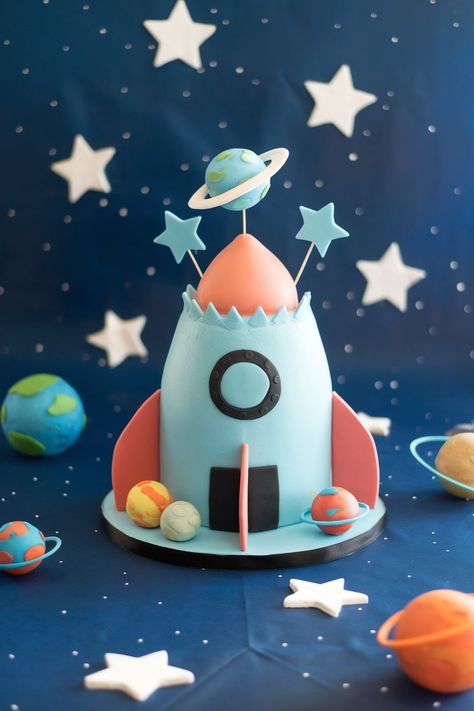 25+ Space Cake Ideas That Are Out of This World - MOMtivational Outer Space Smash Cake, Astronaut Cake Birthday, Space Smash Cake, Space Cake Ideas, Cosmic Cake, Rocket Ship Cake, Space Theme Party Decorations, Rocket Ship Cakes, Solar System Cake