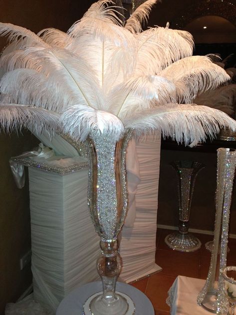 Mardi Gras 2019 Ideas PinWire: Add some extra Glam to your Wedding ! Our stunning hand made ... 11 mins ago - Discover ideas about Crystal Centerpieces ... Feather Centerpieces Glitter Centerpieces Ostrich Feather Centerpieces Feather Bouquet Party Centerpieces.  Source:www.pinterest.com Results By RobinsPost Via Google Feather Arrangements, Ostrich Feather Centerpieces, Feather Centerpieces, Crystal Centerpieces, Gatsby Theme, Tall Vase, Gatsby Wedding, 60th Birthday Party, Masquerade Party