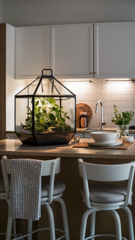 Bring life to your culinary space with a compact terrarium on your kitchen island! This stylish setup, featuring HEMNES bar stools and a VARDAGEN dish set, creates a fresh and welcoming atmosphere. Add a patterned tea towel for personality and let under-cabinet lighting softly highlight the beauty of your decor. Discover how to incorporate greenery into your kitchen and transform it into a vibrant oasis. Click for more inspiration and styling tips! #TerrariumStyle #IKEAHome #KitchenDecor #GreenLiving #HomeInspiration #PlantStyling #FreshInteriors Ikea Style, Ikea Home, Pattern Sewing, Blouse Pattern Sewing, Under Cabinet Lighting, Under Cabinet, Cabinet Lighting, Dish Sets, Blouse Pattern