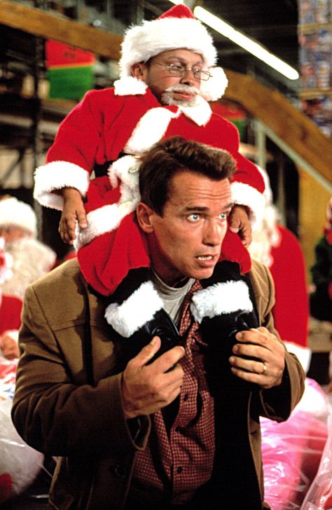 "Jingle All The Way" movie still, 1996.  Top to bottom: Danny Woodburn, Arnold Schwarzenegger. Top 10 Christmas Movies, The Way Movie, Best Holiday Movies, Best Christmas Movies, National Lampoons Christmas, Christmas Pops, National Lampoons Christmas Vacation, Lampoon's Christmas Vacation, Holiday Movie