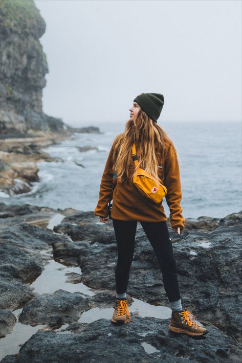 Image of a person hiking during a autumn. They are wearing a stylish outfit featuring Fjallraven gear, Columbia clothing, and Danner boots Outdoor Boots Outfit, Danner Hiking Boots Outfit, Stylish Hiking Outfit Cold Weather, Styling Hiking Boots, Columbia Boots Outfit, Womens Danner Boots Outfits, Hoka Hiking Boots Outfit, Comfy Hiking Outfit, Columbia Boots Woman Outfit