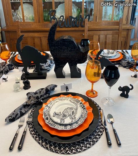 Black Cats on a Halloween Tablescape, table setting, more information about everything on this tablescape and where it all came from in my blog post about it all here: https://www.whispersoftheheart.com/blog/2021/10/5/black-cats-on-a-halloween-tablescape Black Flatware, Small Appetizers, Appetizer Plates Set, Halloween Tablescape, Thanksgiving Tablescapes, White Table Cloth, Kitchen Witch, Black Cat Halloween, White Pumpkins