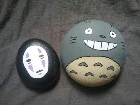 I painted some Studio Ghibli themed rocks. Stone Art Aesthetic, Rock Painting Ideas Studio Ghibli, Studio Ghibli Painted Rocks, Rock Paintings Aesthetic, Studio Ghibli Rock Painting, Anime Rock Painting Ideas, Studio Ghibli Activities, Anime Rock Painting, Aesthetic Stone Painting