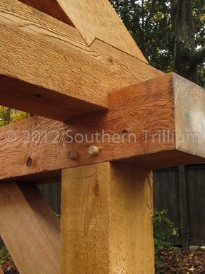 Detail view of the jointwork on the structure. The posts and beams are 8 x8" solid cedar timbers. Tennessee Fieldstone, Timber Joints, Timber Frame Joinery, Timber Frame Construction, Wooden Structure, Wood Joints, Timber Structure, Outdoor Room, Timber Frame Homes