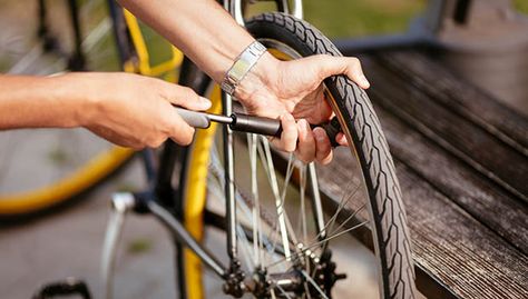 Just like your brakes, bar tape and chain, the tires on your road bike won't last forever. It's just part of doing business, and the more you ride, the more often you'll wear through the rubber compound or damage the tire by riding over glass or debris on the road. The latter is pretty straightforward—if there's a hole or cut in your tire, it's time to replace it—but what are some other signs your road bike tires need to be switched out? Before we get into how to tell, first a word of precaution Bicycle Pumps, Street Stock, Bike Safety, Bicycle Wheel, Rims And Tires, Tubeless Tyre, Hybrid Bike, Bicycle Tires, Bike Tire