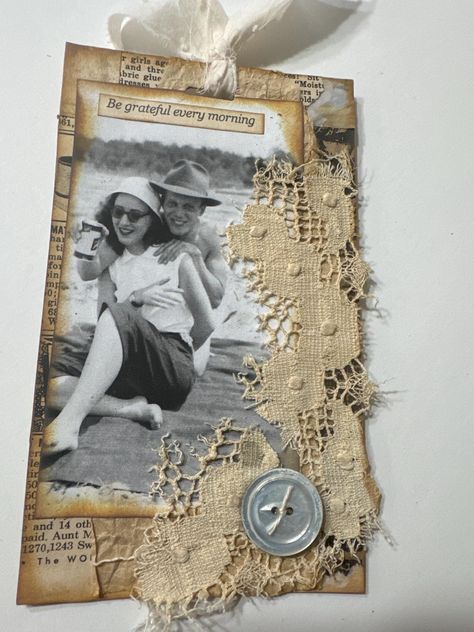 One of a kind decorated master board tag that is made from a master board that was created with vintage papers. Tag is distressed and decorated with fibers, lace, paper, vintage photo and vintage button.  Tag also has a sentiment. The back of the tag is vintage music. This tag is perfect for your junk journals, bookmarks or scrapbook pages. You will receive 1 approximately 6" x 3 1/2" decorated tag. Your tag will arrive packaged in a cellophane bag making it perfect for a treat or gift for your favorite junk journal junkie! Excellent for junk journals, bookmarks, scrapbooking, mixed media art, card making, decoupage, and collage. I usually ship within 2 to 3  days of your order, except if it falls on a weekend or a holiday. Please make sure your address is current and correct on your Etsy Music Junk Journal, Scrapbook Tags Ideas, Vintage Tags Ideas Handmade, Paper Tags Ideas, Junk Journal Tags Ideas, Tags Ideas Handmade, Bookmark Scrapbooking, Bookmarks Scrapbooking, Junk Journal Tags