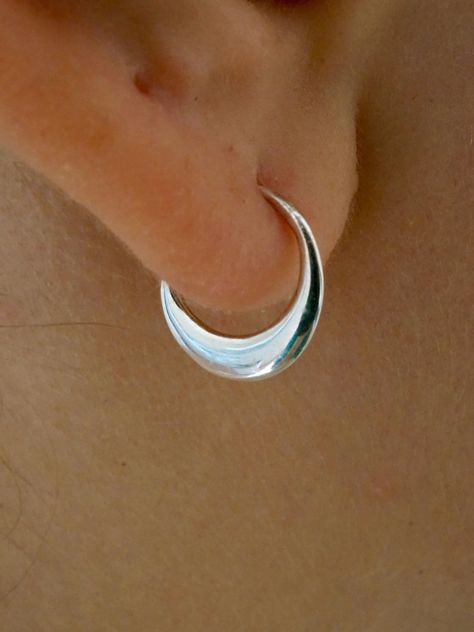 * Tiny Tribal Sleeper Earrings.  * Quantity '1' = one pair of hoops * Inner Hoop Diameter = 9mm * Outer Measurements = 12mm wide x 12mm tall. Elegant and simple little petal earrings that hug the earlobe. .There is an organic curve and taper to these lovely little petals; an artistic depth and dimension. Wear them in your septum, cartilage, tragus, or daith. OPTIONS: 1. Solid 925 Sterling Silver 2. Gold-tone (brass) petals with solid 925 sterling silver ear-wires. WHAT ARE SLEEPER HOOPS? Sleeper Sleeper Earrings, Crescent Moon Earrings, Daith Piercing, Moon Earrings, Everyday Earrings, Jewelry Earrings Hoops, Tragus, Silver Hoops, Gold Plated Jewelry