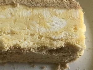 Recipe: Frozen Lemon Mousse | WWOZ New Orleans 90.7 FM Lemon Mousse, Frozen Lemon, Blueberry Sauce, Best Sweets, Cookie Crumbs, Almond Cookies, Graham Cracker Crumbs, Lemon Curd, How To Squeeze Lemons