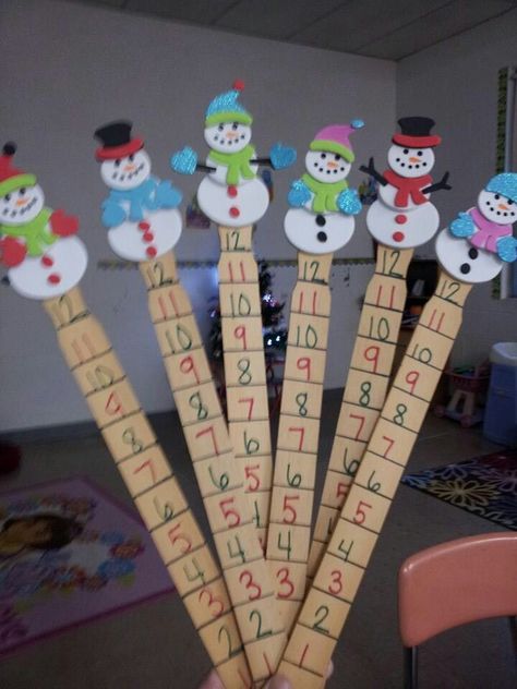 Snow measuring sticks I made. I took a paint stick and marked off the inches with a sharpie. I added a foam snowman at the top. You could glue a wooden one there as well. Diy Snow Measuring Stick, Snow Measuring Stick Diy, Snow Stick, Snow Measuring Stick, Paint Stir Stick Crafts, Foam Snowman, Paint Stick Crafts Diy Projects, Snowmen Ideas, Homeroom Mom