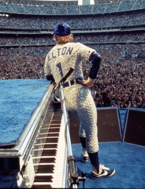 Elton John in custom beaded LA Dodgers uniform by Bob Mackie Elton John Dodger Costume, Elton John Fashion, Elton John Dodgers, Rocket Man Elton John, Elton John 70s, Elton John Rocket Man, Elton John Costume, Captain Fantastic, Rocket Man