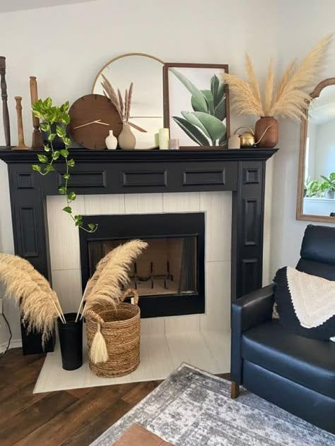 Boho Chic Fireplace Decor, Cozy Mantel Decor, Mantle Decor Black Fireplace, Mantle Modern Decor, Living Room Mantle Decor Modern, Painting Fireplace Mantel Black, Boho Modern Mantle Decor, Modern Boho Mantle Decor, Pampas Grass Fireplace Decor