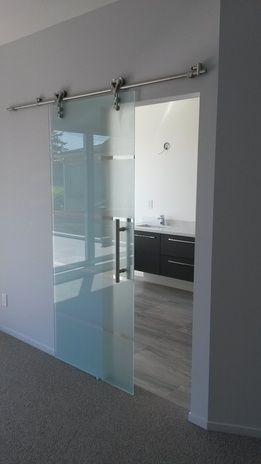 Interior Sliding Barn Doors. A sleek look in Wood or Glass. Modern Bathroom Door, Bathroom Door Ideas, Modern Appartement, Sliding Door Design, Glass Barn Doors, Door Glass Design, Glass Doors Interior, Door Design Modern, Sliding Doors Interior