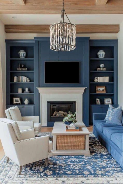 Blue Living Room Ideas Blue Living Room Built Ins, Blue Fireplace Wall Living Room, Dark Blue Built Ins Living Room, Blue Wall Inspiration, Navy Blue Built Ins Around Fireplace, Farrow And Ball Stiffkey Blue Living Rooms, Muted Blue Living Room, Deep Blue Living Room Walls, Navy Blue Feature Wall Living Room