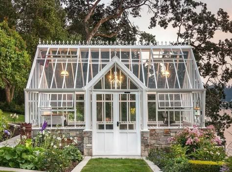 Over 15 of the most beautiful greenhouses that you absolutely need to see! If you're dreaming about a greenhouse for your garden, these ideas will truly inspire you. Suggestions for every size are included--from window sill boxes to full design/build conservatories. | French Creek Farmhouse #greenhousedesign #gardening #sheshed #gardenshed Garden Decor Ideas Diy, Dream Greenhouse, Greenhouses For Sale, Victorian Greenhouse, Victorian Greenhouses, Conservatory Greenhouse, Creative Garden Decor, Greenhouse Interiors, Home Greenhouse