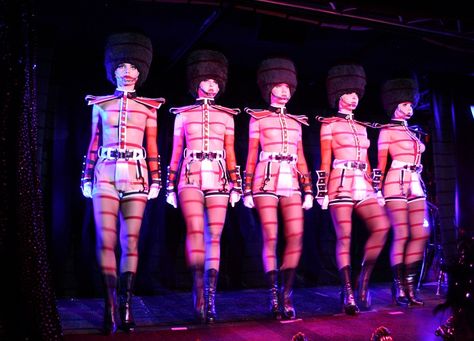 cabaret show dancers standing in a line on stage Paris Cabaret, Soldier Outfit, Cabaret Club, Crazy Horse Paris, Suede Fringe Boots, Beaded Skirt, Charlotte Gainsbourg, Bts Blackpink, Crazy Girls