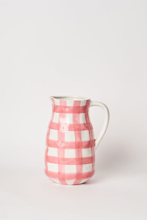 Colourful and unique, this gingham vase has been individually hand painted in pink and white. Featuring a large, curved handle and an overall organic finish with lovely texture, this vase is perfect for large floral arrangements or as a water/punch jug that will bring a joyous feel to any dining table. Gingham Decorations, Large Floral Arrangements, Vase Blue, Pottery Painting Designs, Hand Painted Vases, French Culture, Painted Vases, Ceramic Vases, Large Vase