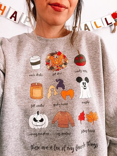 All the comfy cozy 𝘧𝘢𝘭𝘭 𝘷𝘪𝘣𝘦𝘴 🍂🎃👻⁣⁣ ⁣⁣⁣ We have a Christmas version coming next month and I cannot wait! While fall is my favorite season, Christmas is my favorite time of the year! ⁣ ⁣ Are you more spooky fall or happy holidays? Disney Style | Disney Fashion | Disney Instagram | Disney Outfit Ideas | Disney Shirt | Disney Photo Ideas | Disney World Fall Halloween Autumn Aesthetic, Outfit Inspo Halloween, Cozy Fall Vibes, Spooky Fall, The Comfy, Fall Feels, Fall Halloween Decor, Favorite Season, Autumn Cozy