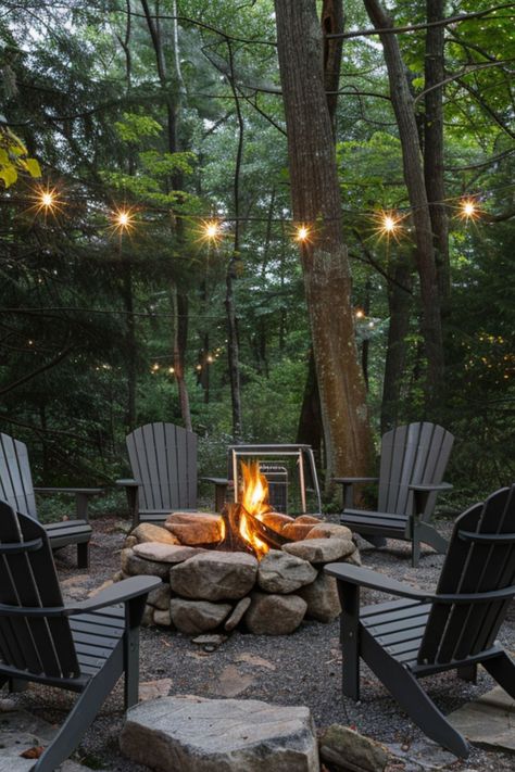 Get inspired with 40 unique backyard fire pit designs that fit any small yard. These simple, budget-conscious ideas include DIY options for both square and round pits, perfect for creating a cozy outdoor lounge space. Fire Pit Lakeside, Fire Pit In The Woods Ideas, Forest Lounge Ideas, Rustic Firepit Outdoor, Fire Pit Cabin, Fire Pit Cottage, Large Rock Fire Pit, Forest Fire Pit, Lake Fire Pit