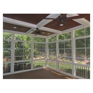 An EzeBreeze porch with a coffer ceiling, Trex decking and Deckorator railing. Enclosed Patio Ideas Sunroom, Enclosed Deck, Outdoor Screen Room, Enclosed Decks, Enclosed Patio Ideas, Coffer Ceiling, Porch Lanterns, Patio Addition, Trex Decking