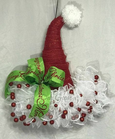 This was the hat that started it ALL!!!  I did a FaceBook Live that showed how to turn a Dollar Tree Witch Hat into a Santa Hat and then the hats took over.  You see them everywhere and others doing Lives now showing how to do them.  It's a easy project and for anyone.   First you need to unravel all the garland and remove everything from the Dollar Tree Witch hat.Next you will need to add 2 Dollar Tree mesh of your color around the top of the hat.  Next you will cut 3 (Dollar Tree Rol… Dollar Tree Witch Hat, Decorated Hats, Mesh Projects, Wreaths Design, Diy Hats, Christmas Florals, Hat Wreath, Dollar Store Halloween, Christmas Hats