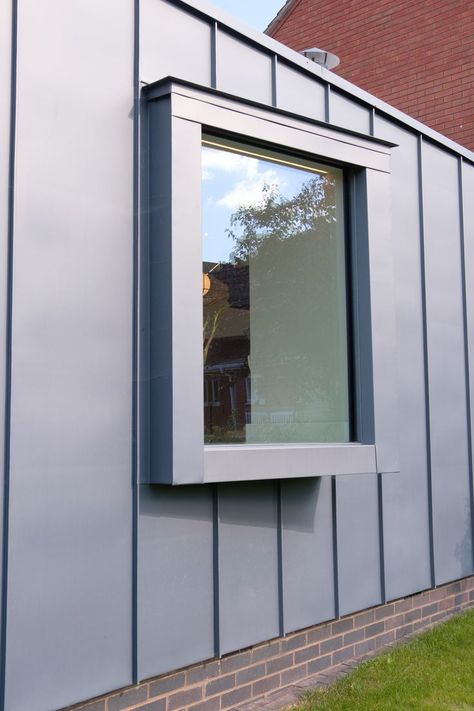 A frameless picture window creates a stream of natural light through the zinc exterior design. Window Bump Out, Window Framing, Scandinavian Modern House, Zinc Cladding, Roof Cladding, Window Designs, Garage Exterior, House Garage, Window Detail