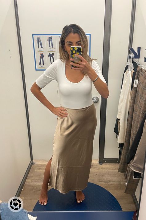 Old Navy Summer to Fall Transition. Champagne midi skirt and white bodysuit. Follow my shop @TheStylishSicilian on the @shop.LTK app to shop this post and get my exclusive app-only content! #liketkit #LTKsalealert #LTKunder50 #LTKSeasonal @shop.ltk https://liketk.it/4hkkA Silk Skirt Outfit Winter, Silk Skirt Outfit, Midi Slip Skirt, Winter Skirt Outfit, Fall Transition, Summer To Fall, Skirt For Women, Slip Skirt, White Bodysuit