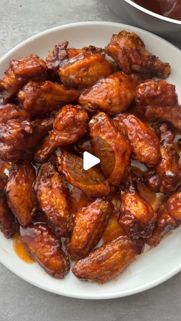 Alia Nadeem - Food & Recipes on Instagram: "Honey BBQ Chicken Wings

Crispy, sticky, HONEY BBQ CHICKEN WINGS, made in the air fryer! Glazed in a honey bbq sauce. Recipe below. SAVE 🍗 

Ingredients -
1kg Chicken wings, washed and patted dry 
1 tbsp Baking powder
1 tbsp Cornflour 
1 tsp each of the following - Old bay, Ground black pepper, Onion granules, Garlic granules, Smoked paprika, paprika
Cooking oil (spray)

For the Honey BBQ glaze -
1 tbsp Unsalted Butter
1 cup BBQ sauce 
1/2 cup Honey 
20ml Water 

Method 
Step 1 - In a large bowl, add the chicken  wings. Now add the dry seasonings
and coat well, next add the corn flour and baking powder and mix well again, making sure all the wings are evenly coated.

Step 2 - Set your air fryer to 190c, for 20 minutes. Spray the tray with a litt Honey Glaze Chicken Wings, Air Fryer Chicken Wings Honey Bbq, Honey Old Bay Wings Air Fryer, Honey Barbecue Wings, Sticky Bbq Chicken Wings, Chicken Wings Crispy, Honey Bbq Sauce Recipe, Wings Crispy, Honey Bbq Chicken Wings