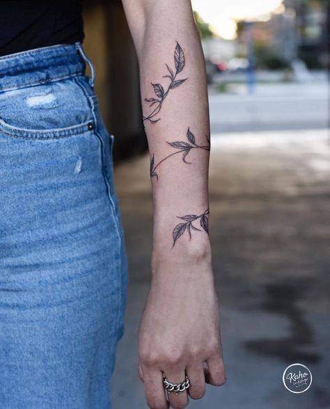 Vine Cuff Tattoo, Lord Of The Rings Leaf Tattoo, Unique Vine Tattoos, Olive Leaf Tattoo Arm, Wrapped Ivy Tattoo, American Traditional Wrap Around Tattoo, Vine Tattoo On Arm, Vine Butterfly Tattoo, Thorny Vine Tattoo